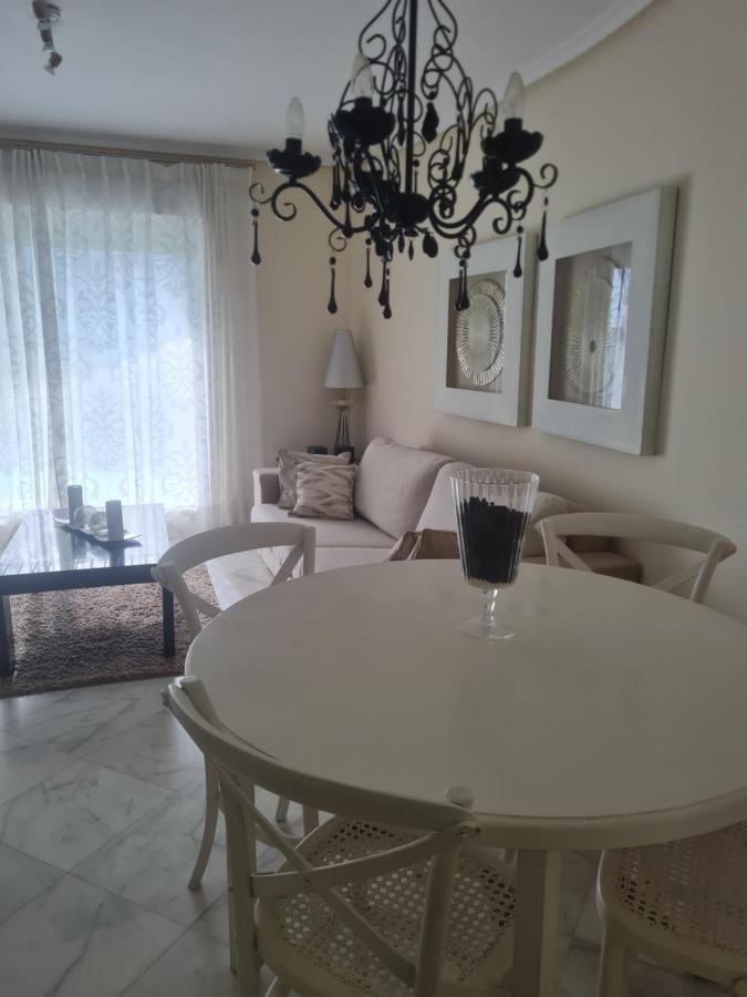 Elegant 2-Bedroom Apartment In Benidorm With Private Pool And Scenic Garden Views Кала-де-Финистрат Экстерьер фото