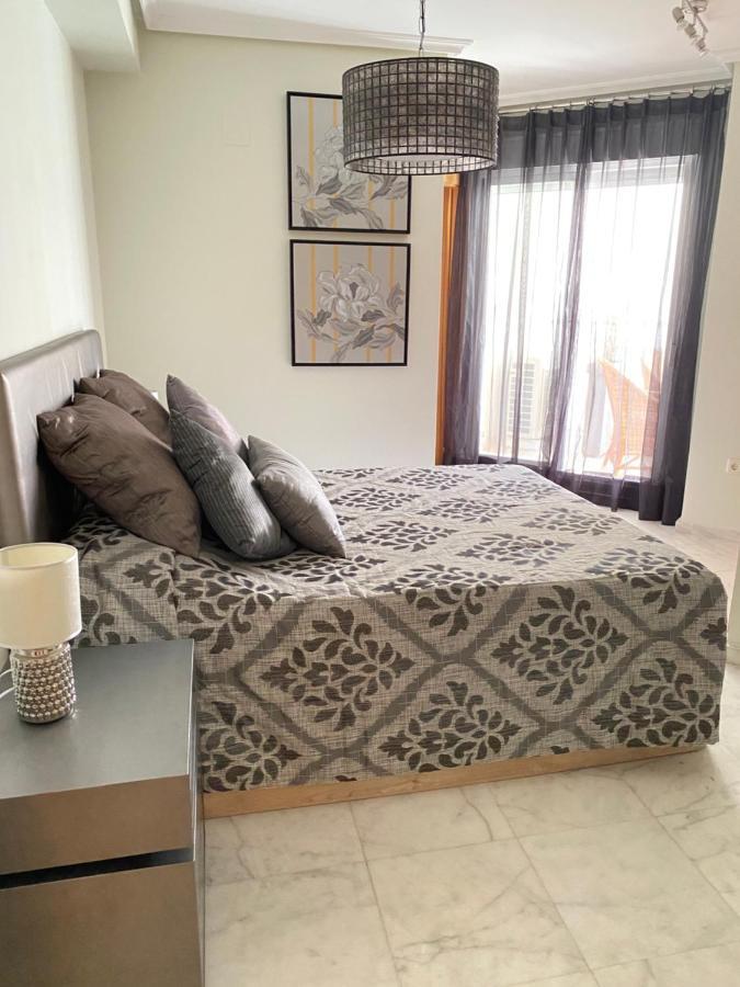 Elegant 2-Bedroom Apartment In Benidorm With Private Pool And Scenic Garden Views Кала-де-Финистрат Экстерьер фото