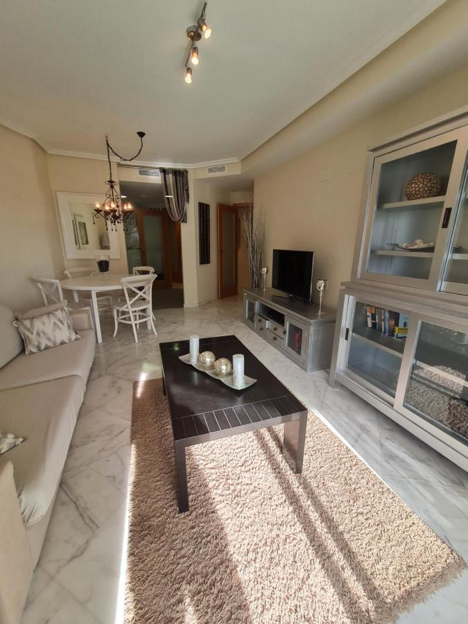 Elegant 2-Bedroom Apartment In Benidorm With Private Pool And Scenic Garden Views Кала-де-Финистрат Экстерьер фото